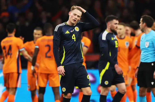 Scott McTominay looks dejected after Scotland concede against the Netherlands