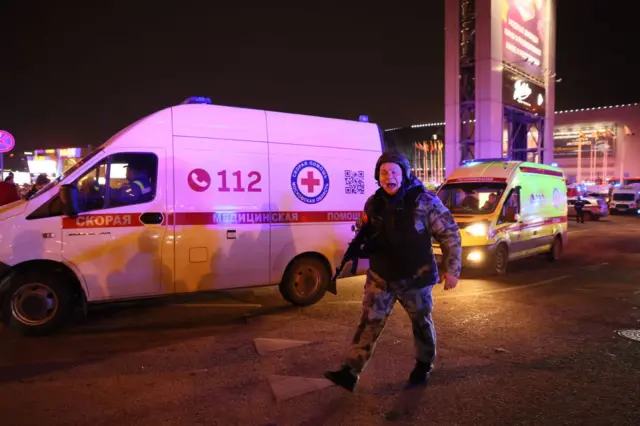 A police officer shouts as law enforcement responds to the attack