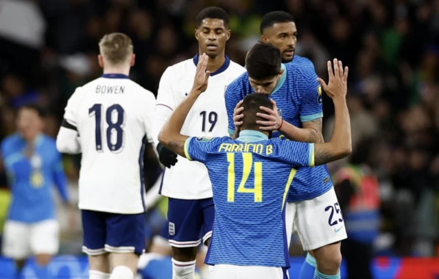 Brazil's Fabricio Bruno and Lucas Beraldo celebrate after the match