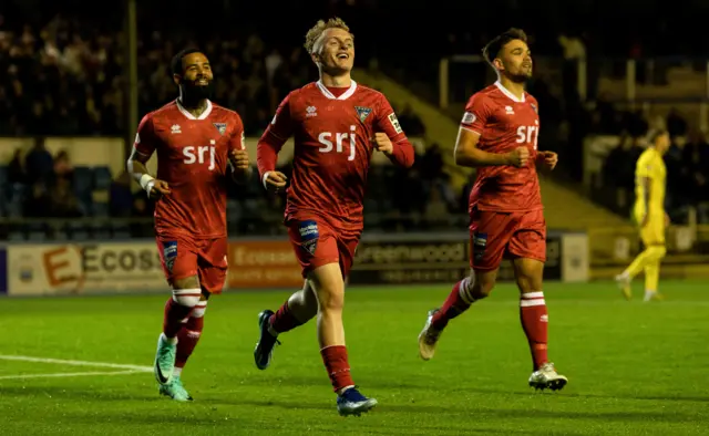 Owen Moffat celebrates