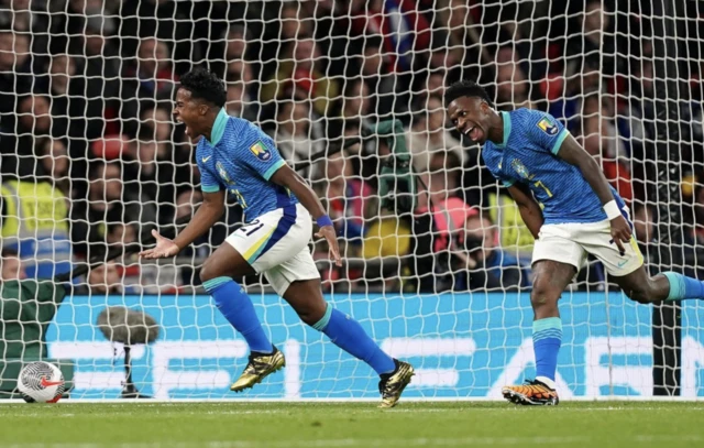 Brazil's Endrick (left) celebrates scoring the opening goal of the game