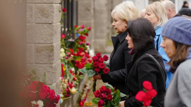 Since the very morning, residents and guests of Minsk have been walking in an endless stream to the spontaneous memorial near the building of the Russian Embassy  People bring flowers, candles and children's toys in memory of the victims of the terrible terrorist attack at Crocus City Hall.