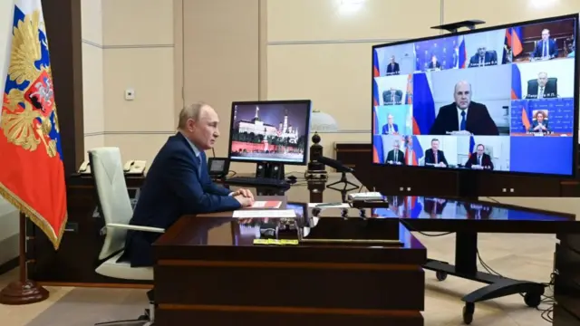 Russian President Vladimir Putin chairs a Security Council meeting via a videoconference at the Novo-Ogaryovo state residence, outside Moscow, on March 22, 2024