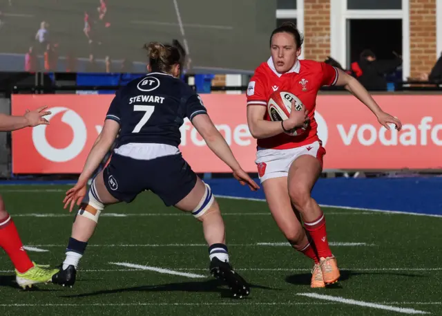 Wales' Jenny Hesketh runs with the ball