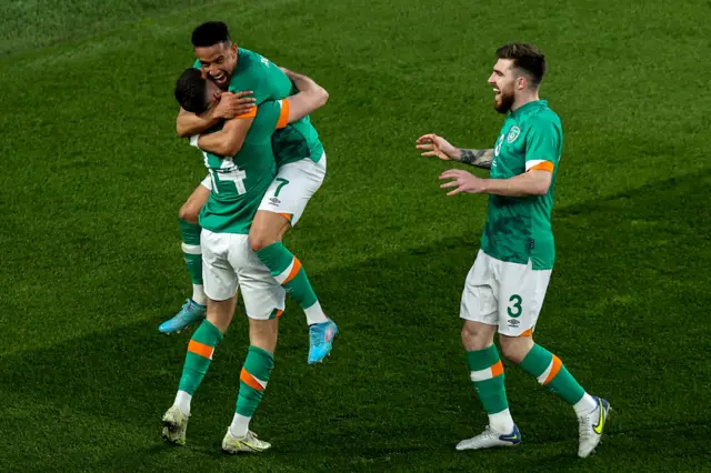 Alan Browne celebrates after scoring a goal with Callum Robinson and Ryan Manning