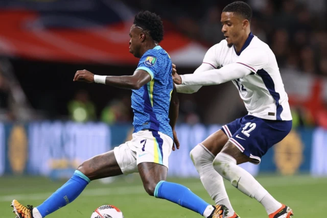 Brazil's Vinicius Junior in action with England's Ezri Konsa