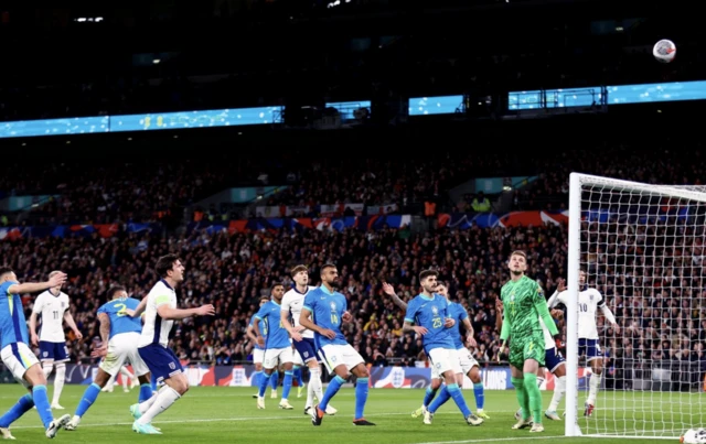 Harry Maguire watches his header go over the bar