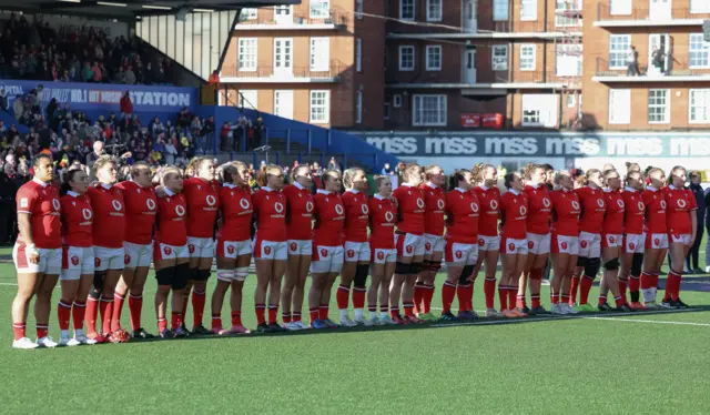 Wales players sing the national anthem