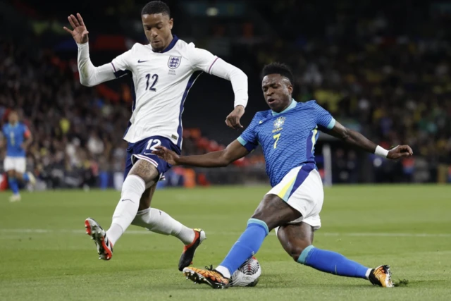 Brazil's Vinicius Junior in action with England's Ezri Konsa