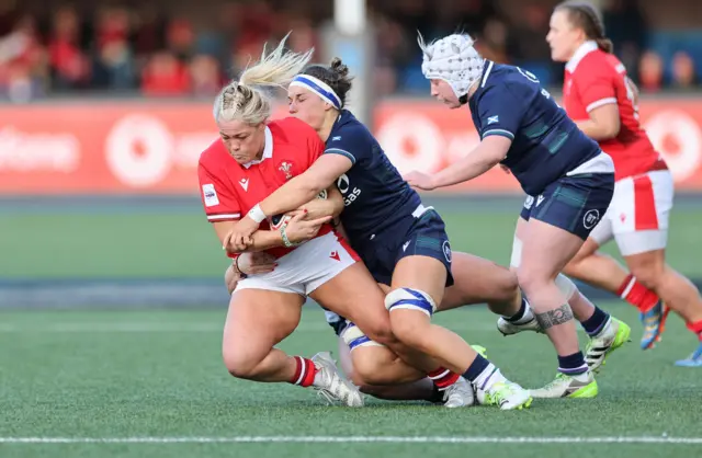 Wales' Kelsey Jones is tackled