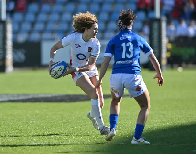 Ellie Kilduune of England passes the ball under pressure Michela Sillari