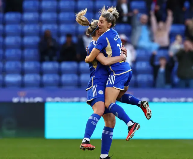 Petermann celebrates her eqauliser for Leicester