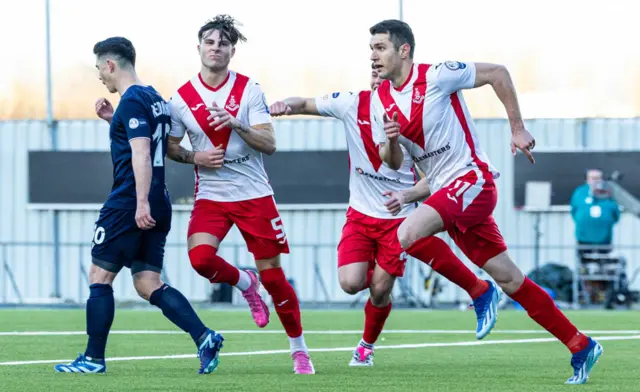 Airdrie's Nikolay Todorov celebrates as he scores from the penalty spot to make it 2-1 during the SPFL Trust Trophy Final match between The New Saints and Airdrieonians at Falkirk Stadium, on March 24, 2024, in Falkirk, Scotland.