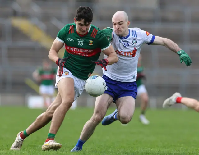 Kevin Loughran tacklesTommy Conroy