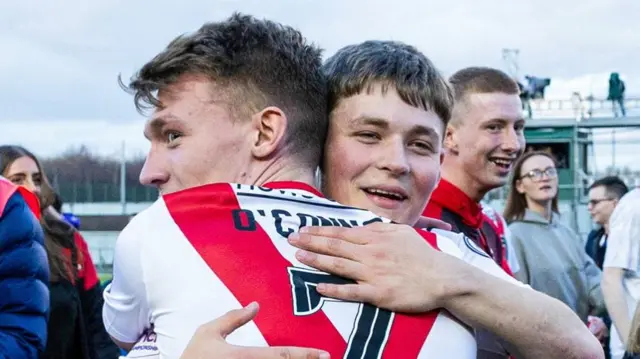 Airdrie's Josh O'Connor and Dean McMaster celebrate at full time as they win the SPFL Trust Trophy during the SPFL Trust Trophy Final match between The New Saints and Airdrieonians at Falkirk Stadium, on March 24, 2024, in Falkirk, Scotland.