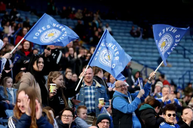 Fsns wave flags with the club crest ahead of kick off