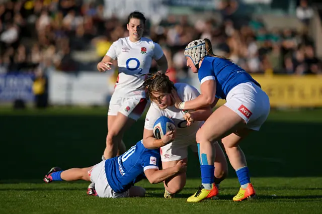 Maud Muir of England is tackled by Veronica Madia