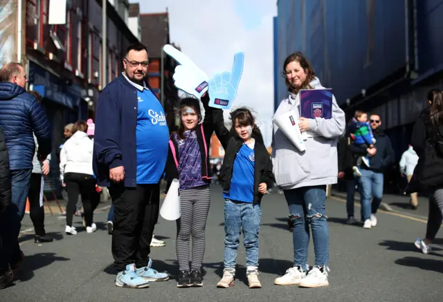 An Everton family arrive at Goodison