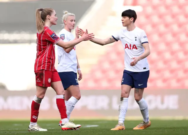 Rogers and Neville shake hands at full time