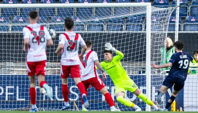 TNS' Ben Clarke scores to make it 1-0 during the SPFL Trust Trophy Final match between The New Saints and Airdrieonians at Falkirk Stadium, on March 24, 2024, in Falkirk, Scotland.