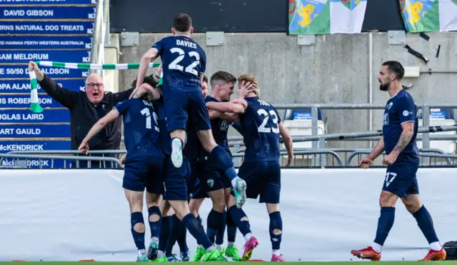 TNS' Ben Clarke celebrates as he scores to make it 1-0 during the SPFL Trust Trophy Final match between The New Saints and Airdrieonians at Falkirk Stadium, on March 24, 2024, in Falkirk, Scotland.