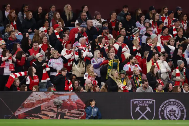 Fans celebrate the equaliser from Pelova