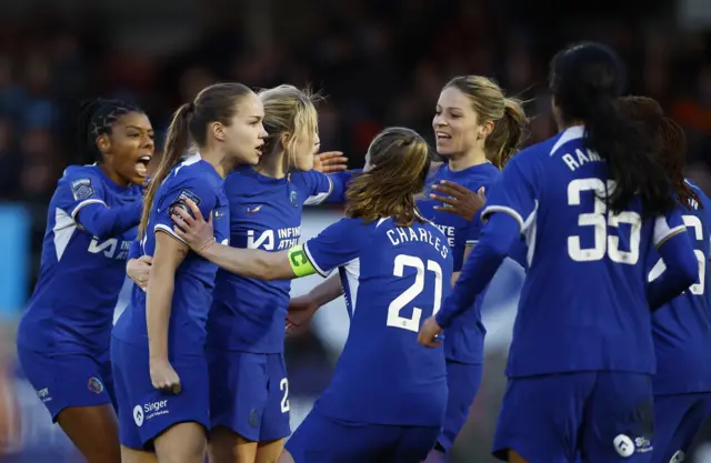 Chelsea players celebrate Cuthbert's goal