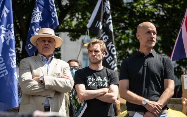 Iain Duncan Smith, campaigner Luke de Pulford and MP Stephen Kinnock attend a rally for Hong Kong democracy at the Marble Arch in June 2021