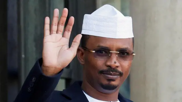 President of Chad Mahamat Idriss Deby gestures as he arrives for a meeting over security in the Sahel region at the Elysee Palace in Paris, France, November 12, 2021.