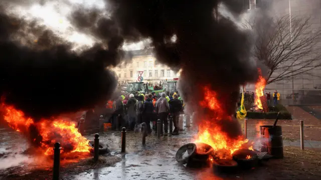 Tyres were set on fire outside the European Union HQ in Brussles, Belgium, last month