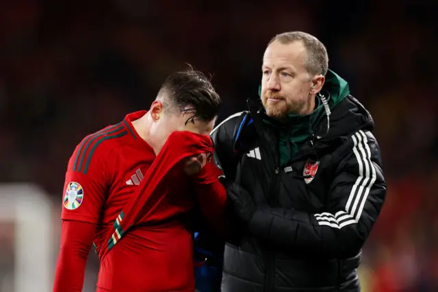 Wales' Connor Roberts looks dejected