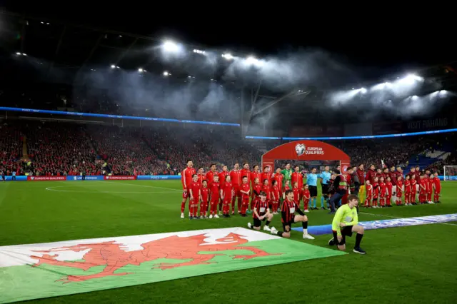 Wales players sing the national anthem