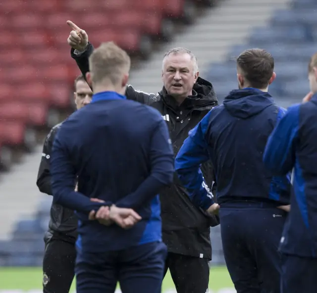 Michael O'Neill speaks to his Northern Ireland players