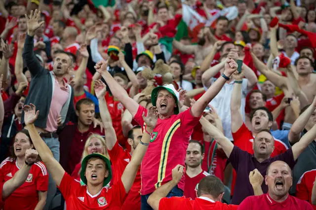 Wales fans celebrate beating Belgium