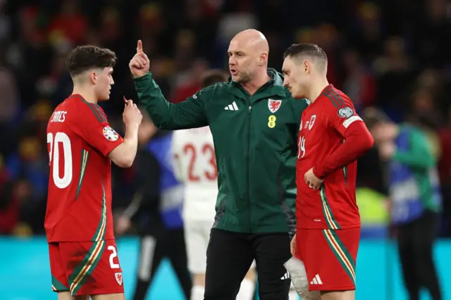 Wales boss Rob Page gives instructions to Dan James