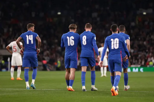 England players wear nameless shirts