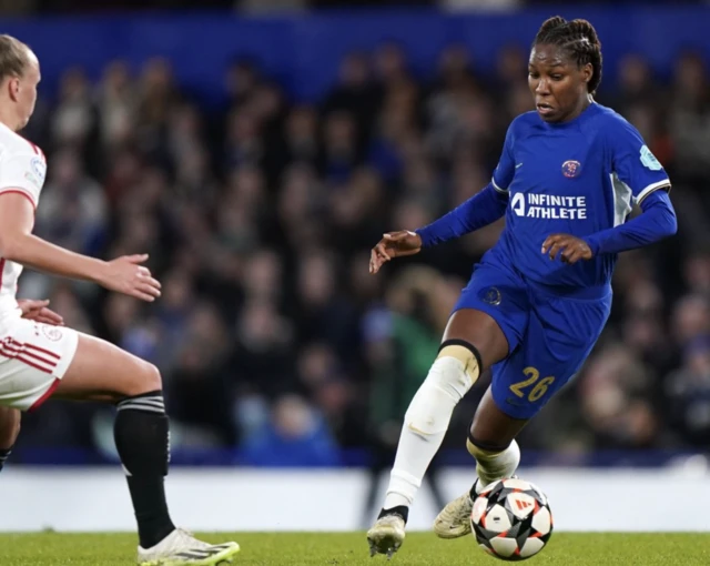 Tiny Hoekstra (left) and Chelsea's Kadeisha Buchanan battle for the ball