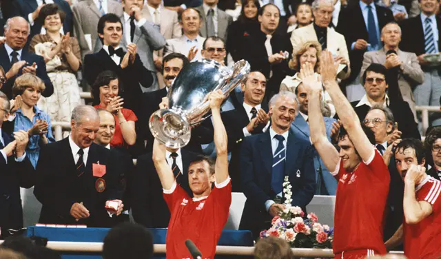 Nottingham Forest captain John McGovern lifts the trophy as team-mates Larry Lloyd (centre) and Frank Clark (right) look on after the 1979 European Cup Final between Nottingham Forest and Malmo