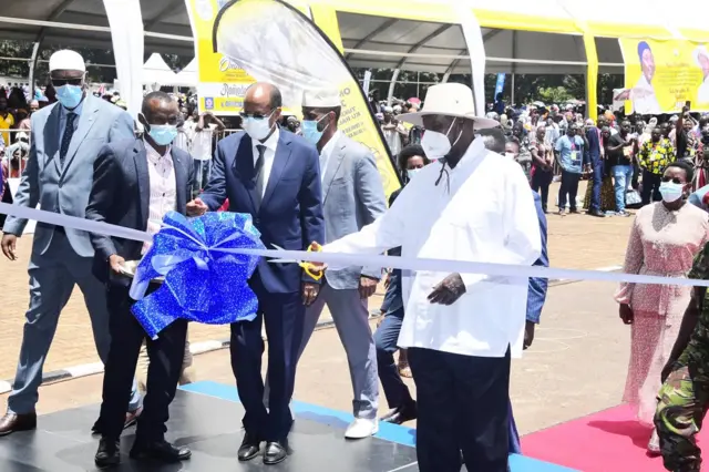 President Yoweri Museveni in a white shirt