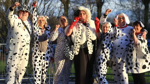 Darts fans in fancy dress