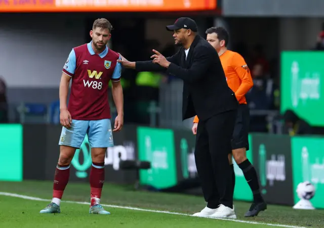 Vincent Kompany talks to Charlie Taylor