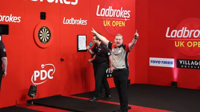 Dimitri Van den Bergh celebrates