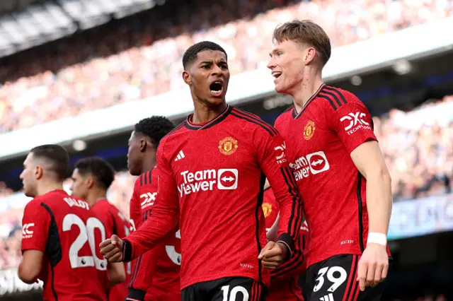 Marcus Rashford of Manchester United celebrates with Scott McTominay