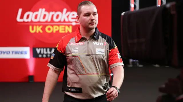 Dimitri Van den Bergh walks off stage