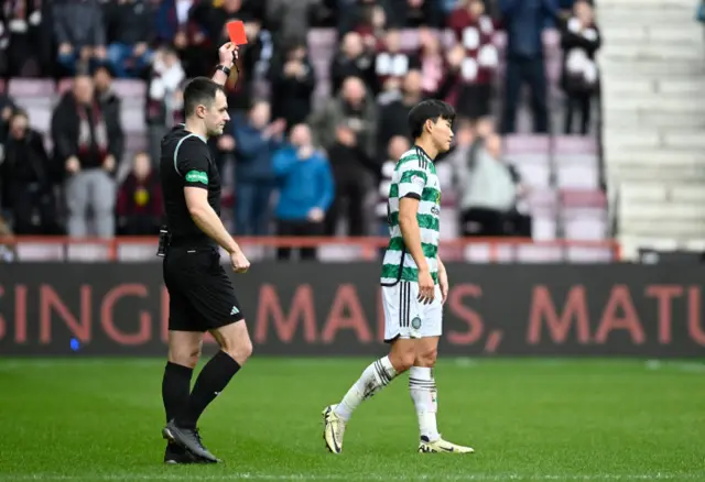 Yang is shown red by referee Don Robertson after his high boot caught Alex Cochrane