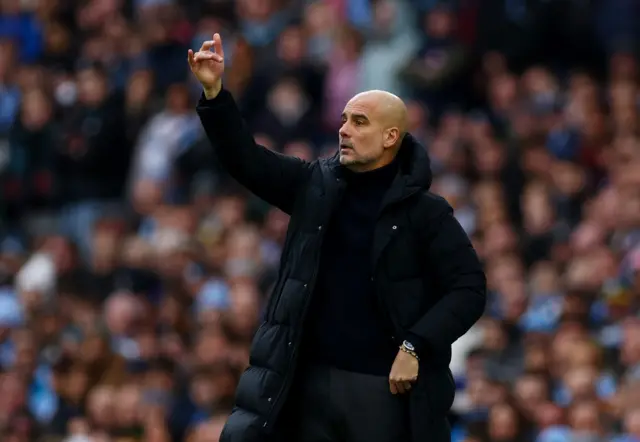 Pep Guardiola on the touchline