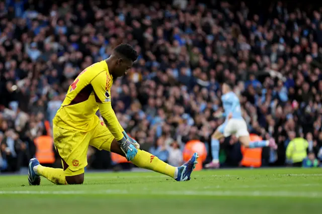 Andre Onana of Manchester United looks dejected