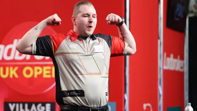 Dimitri Van den Bergh celebrates
