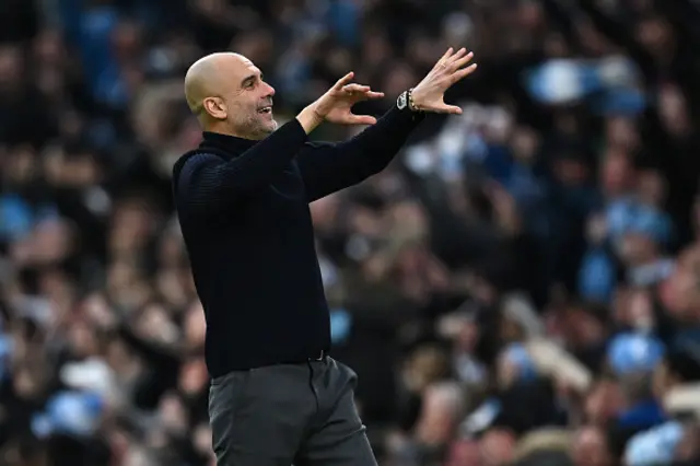 Pep Guardiola celebrates