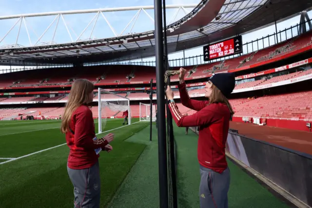 Ground staff at Emirates Stadium